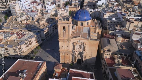 Discover the Beauty of Costa Blanca's Baroque Monument: Aerial Drone Footage of the Basilica Santa Maria in Elche, Spain and its Sculptures. Cinematic Revealing shot photo