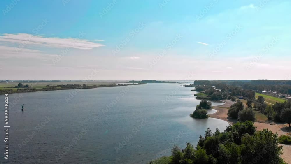 Aerial ascending drone shot of a lake in Zeewolde, The Netherlands Aerial ascending drone shot of a lake in Zeewolde, The Netherlands