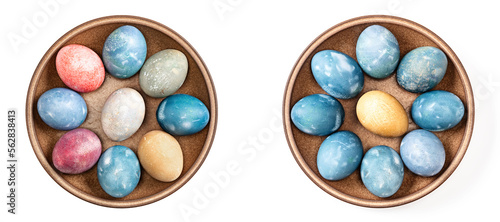 Photography Different easter eggs in ceramic bowl on white