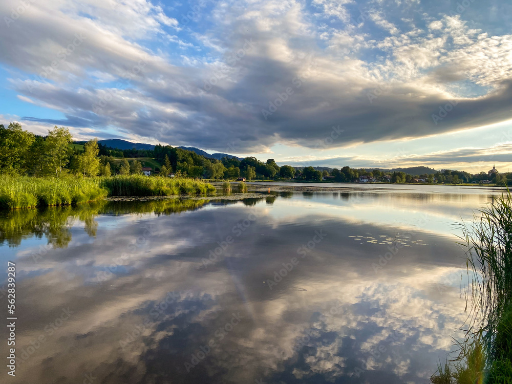 Scenic sky above the lake of Bad Bayersoien in the Bavarian Alps, Germany Scenic sky above the lake of Bad Bayersoien in the Bavarian Alps, Germany