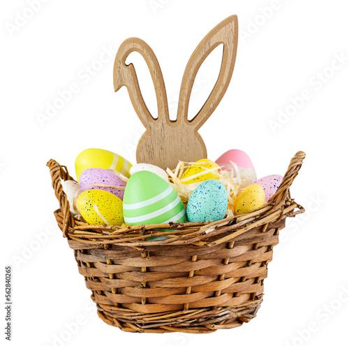 Basket with colourfull Easter eggs and bunny figure isolated on white