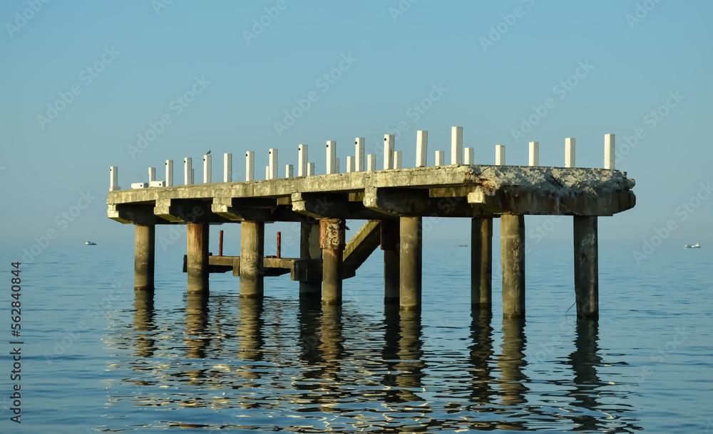 Pier, sea, dominance of blue tones