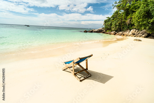 Empty tropical beach landscape. Travel vacations destination. Sunbed on the sand. Tourism. Nature.Relax