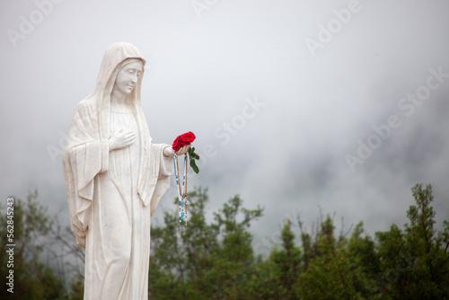 Statue of the Blessed Virgin Mary on Mount Podbrdo, the Apparition hill overlooking the village of Medjugorje in Bosnia and Herzegovina. 2021/12/29. photo