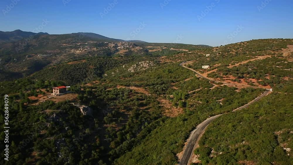 Aerial view of mountain road in sunny day Aerial view of mountain road in sunny day