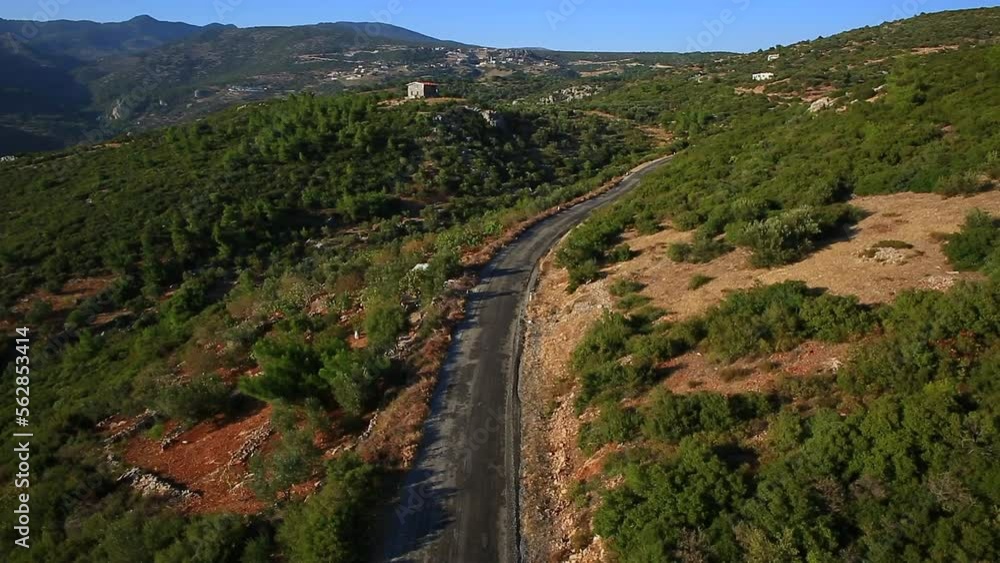 Aerial view of mountain road in sunny day Aerial view of mountain road in sunny day