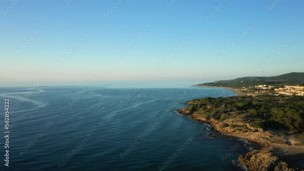 The arid countryside around Marina del Cantone on the Tyrrhenian Sea in Europe, Italy, Campania, in summer on a sunny day. The arid countryside around Marina del Cantone on the Tyrrhenian Sea in Europe, Italy, Campania, in summer on a sunny day.
