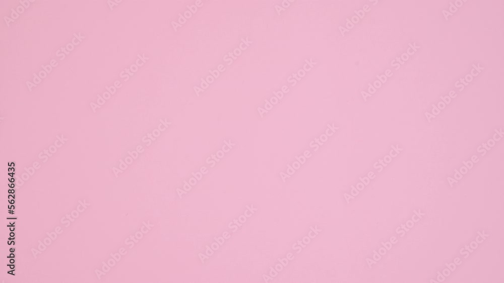 Balloon heart flies from skeleton hands on pastel pink background. Stop motion. Flat lay Balloon heart flies from skeleton hands on pastel pink background. Stop motion. Flat lay
