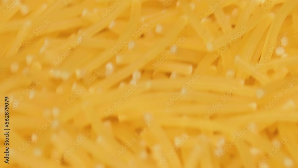 Raw Uncooked Noodles Rotating - Macro. Dry Vermicelli Turning Around - Close-Up. Raw Pasta Raw Uncooked Noodles Rotating - Macro. Dry Vermicelli Turning Around - Close-Up. Raw Pasta