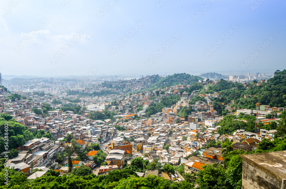 Buildings of Favela or Communinity Santa Marta mountain behind in Rio de Janeiro, Brazil.