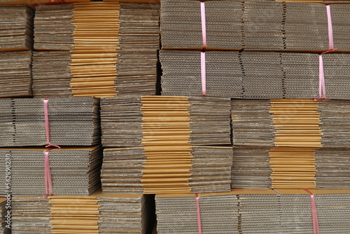 Obraz na plátně Piles of paper cardboard postal boxes in store factory manufacturer supplier or