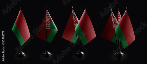 Small national flags of the Belarus on a black background photo