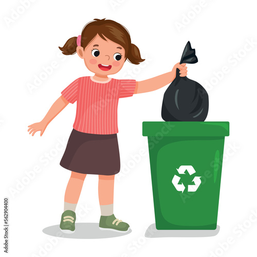 cute little girl taking out the trash in garbage bag into recycling bin doing daily routine housework chores at home