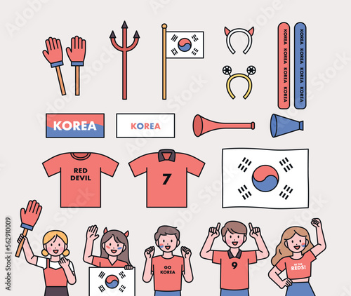 Korea's soccer cheering team Red Devils supporters. Supporting items and fans cheering.