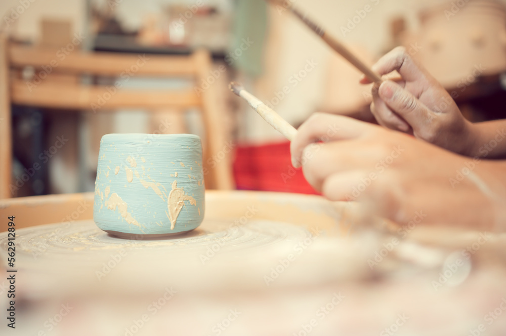 Painting the sculpture is one of the artist pottery processes. Painting the sculpture is one of the artist pottery processes.