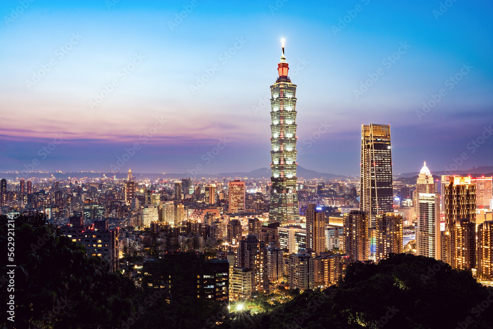 View from above, stunning aerial view of the Taipei City skyline illuminated at sunset. Panoramic view from the Mount Elephant in Taipei, Taiwan.