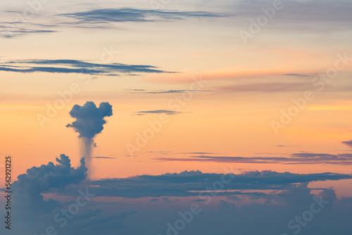 Stunning dramatic sky with some clouds and a cumulonimbus cloud producing torrential rain. Sunset, romantic sky, natural background, climate changes concept.