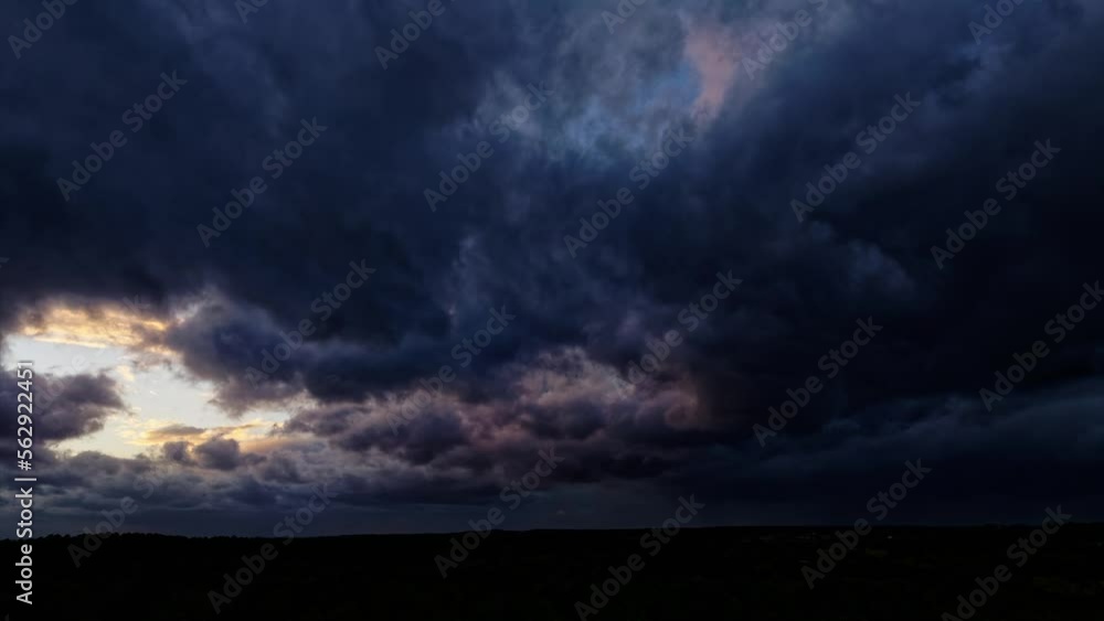 By drone over a stormy sky with dark and threatening clouds, illuminated by lightning, giving the impression of a coming storm, offering an intense and striking aerial view of the storms. By drone over a stormy sky with dark and threatening clouds, illuminated by lightning, giving the impression of a coming storm, offering an intense and striking aerial view of the storms.