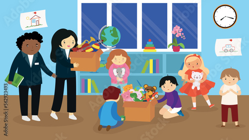 Children in kindergarten unpack toys