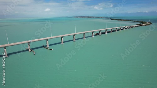 Long bridge on overseas highway in Florida keys, with boat channel underneath. photo