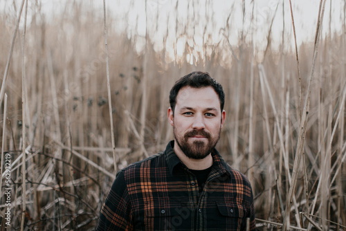 Young man in front of reeds, Portland, Maine, USAÂ  photo