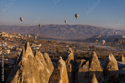 Goreme, Turkey - Mountain landscape with hot air balloons in Goreme, Cappadocia, Turkey