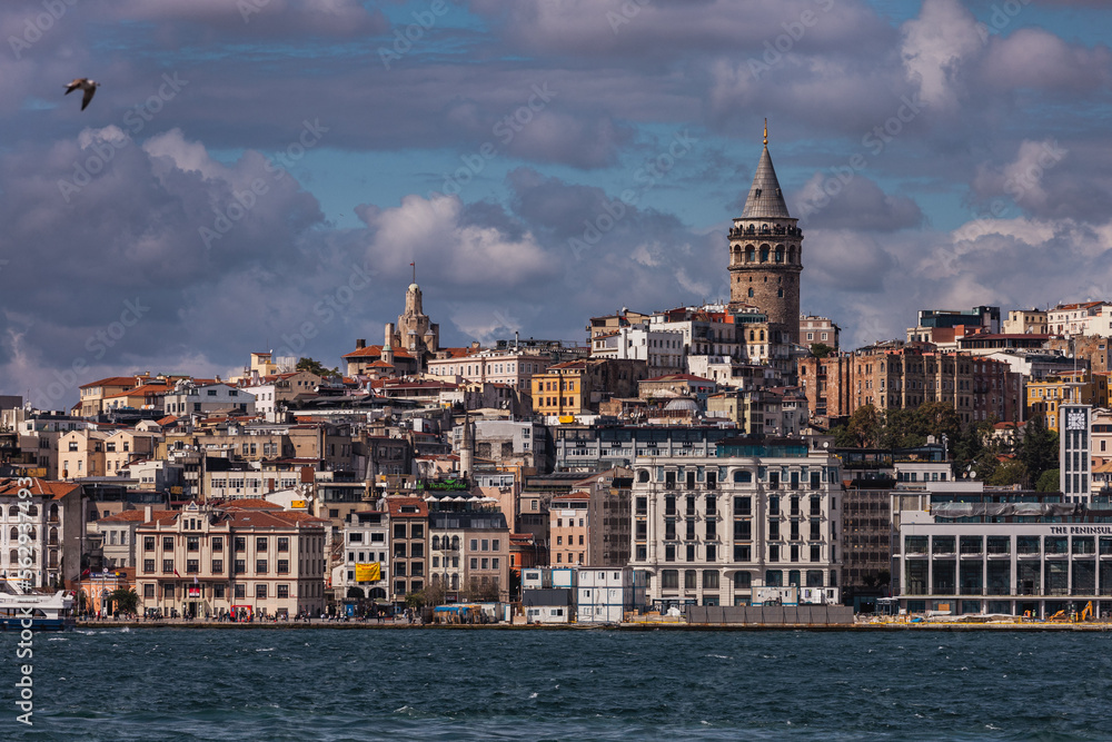Cityscape of Istanbul. Old city with colored buildings. Eminonu ferry docks overlook the mouth of the Golden Horn.