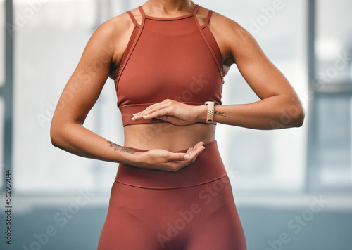 Fitness, woman and hands in spiritual tai chi training, exercise or yoga for healthy mind and body at the gym. Female holding ball of energy in practice for healing, chakra or balance for wellness photo