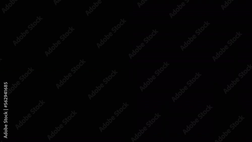 Video „Point light of a bright flashlight directed at the camera on ...