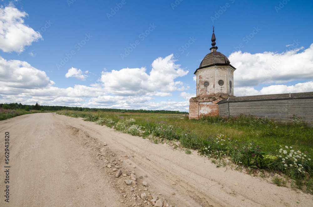 The ancient helmet-shaped tower of the fence of the Oshevensky Monastery. Russia, Arkhangelsk region, Kargopolsky district
