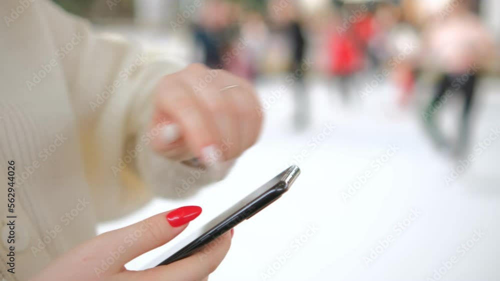 Smart watch. Smart watch on a woman's hand indoor. Woman's hand touching a smart watch Smart watch. Smart watch on a woman's hand indoor. Woman's hand touching a smart watch
