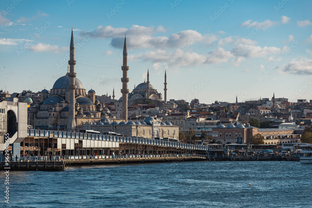 Istanbul. Beautiful view of Eminonu area in Fatih area on the Golden Horn with Suleymaniye Mosque on a cloudy day