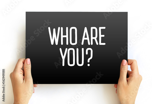 Who Are You question text on card, concept background