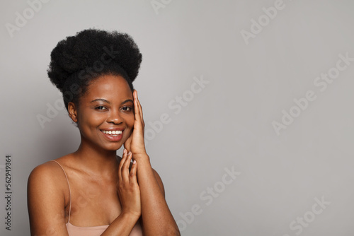 Beautiful model woman smiling on white background