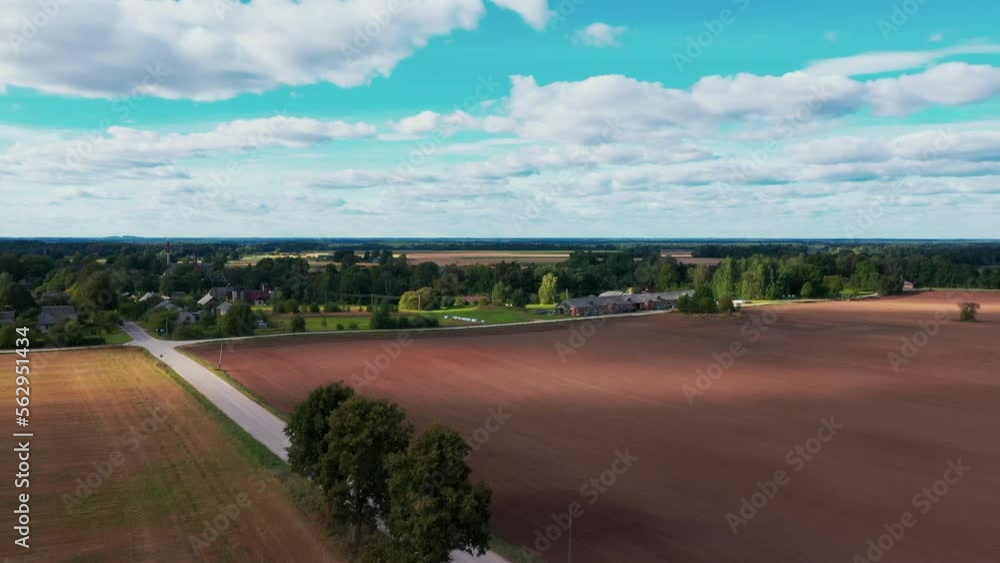 Rural scene with old farmhouse on sunny spring day, aerial dolly in Rural scene with old farmhouse on sunny spring day, aerial dolly in