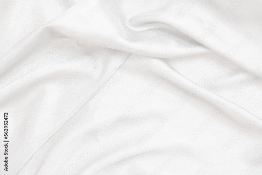 Smooth elegant white silk fabric or satin luxury cloth texture for abstract background
