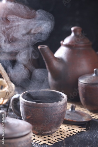 Obraz na plátně Tea is an aromatic beverage prepared by pouring hot or boiling water over cured