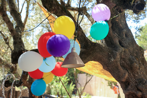 Color baloons in garden. Outdoor bithday party, event, celebration background photo