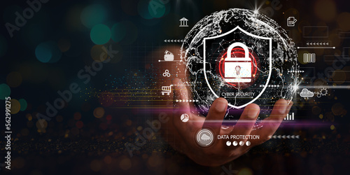 Businessman holding shield protect icon. Protection network security computer and safe your data concept, lock symbol, concept about security, cybersecurity and protection against dangers. © Smile Studio AP