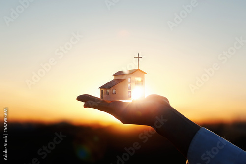 Billede på lærred Precious and beautiful temple and church architecture and cross on hand and brig