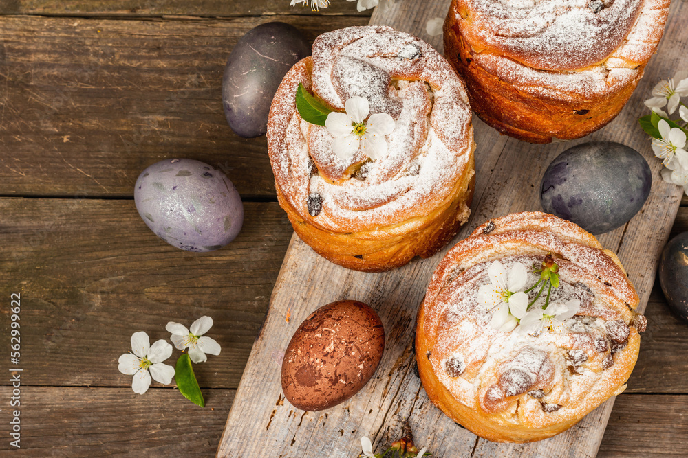 Easter cake Cruffin or sweet bread kulich with painted eggs. Traditional festive baking Easter cake Cruffin or sweet bread kulich with painted eggs. Traditional festive baking