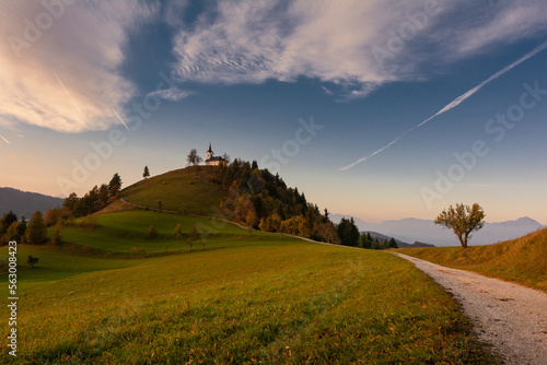 Picturesque landscape with church in Slovenia on green hill
