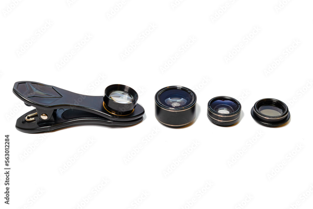 Additional lenses with a clothespin for a smartphone camera on a white background isolated Additional lenses with a clothespin for a smartphone camera on a white background isolated