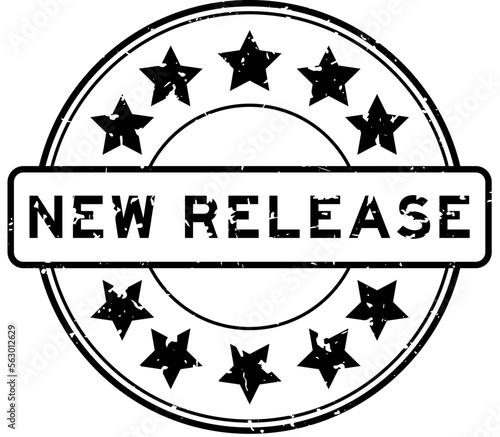 Grunge black new release word with star icon round rubber seal stamp on white background