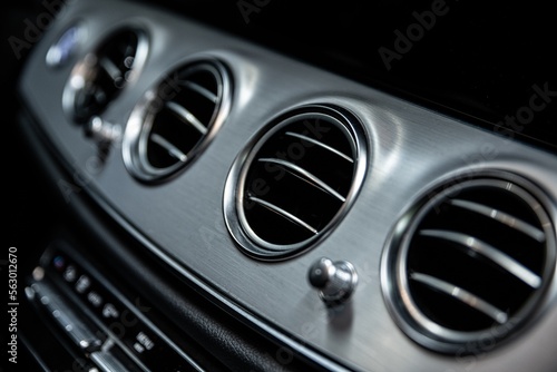 Ventilation and air conditioning vents in the interior of a modern car