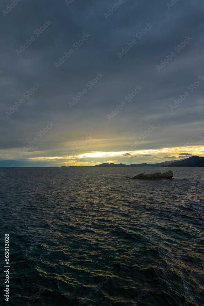 A magical evening atmosphere on the seashore in Greece. A magical evening atmosphere on the seashore in Greece.