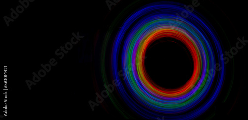 Black hole concept with ring of colorful lights around in astronomy concept