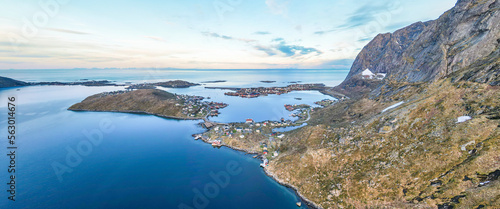 Aerial landscapes of the city of Reine in Lofoten, Norway, during spring on a clear day with clouds