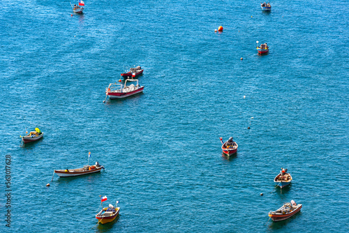 View from above of little fishing boats in the coasts of Antofagasta, Chile photo