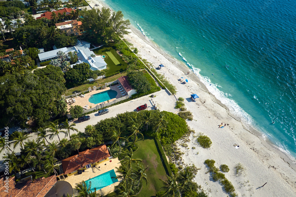 Aerial view of expensive residential houses in island small town Boca